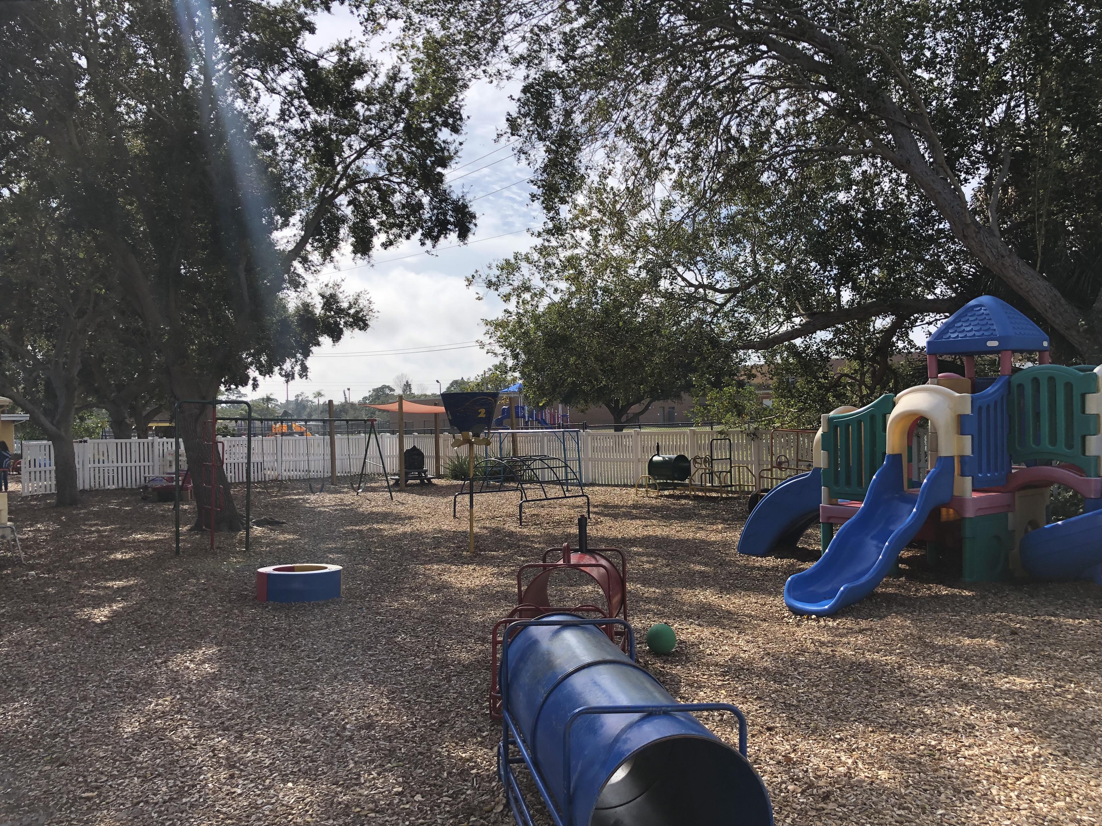 Toad Hall playground with play structures and slide