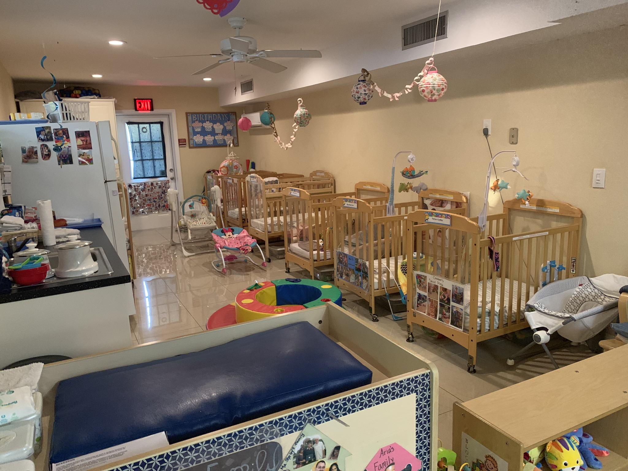 Otters infant room overview with cribs and care areas